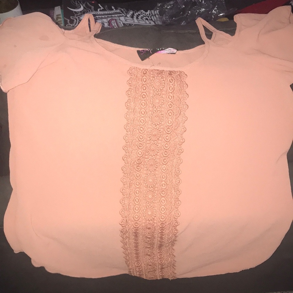 Peachy tone blouse.